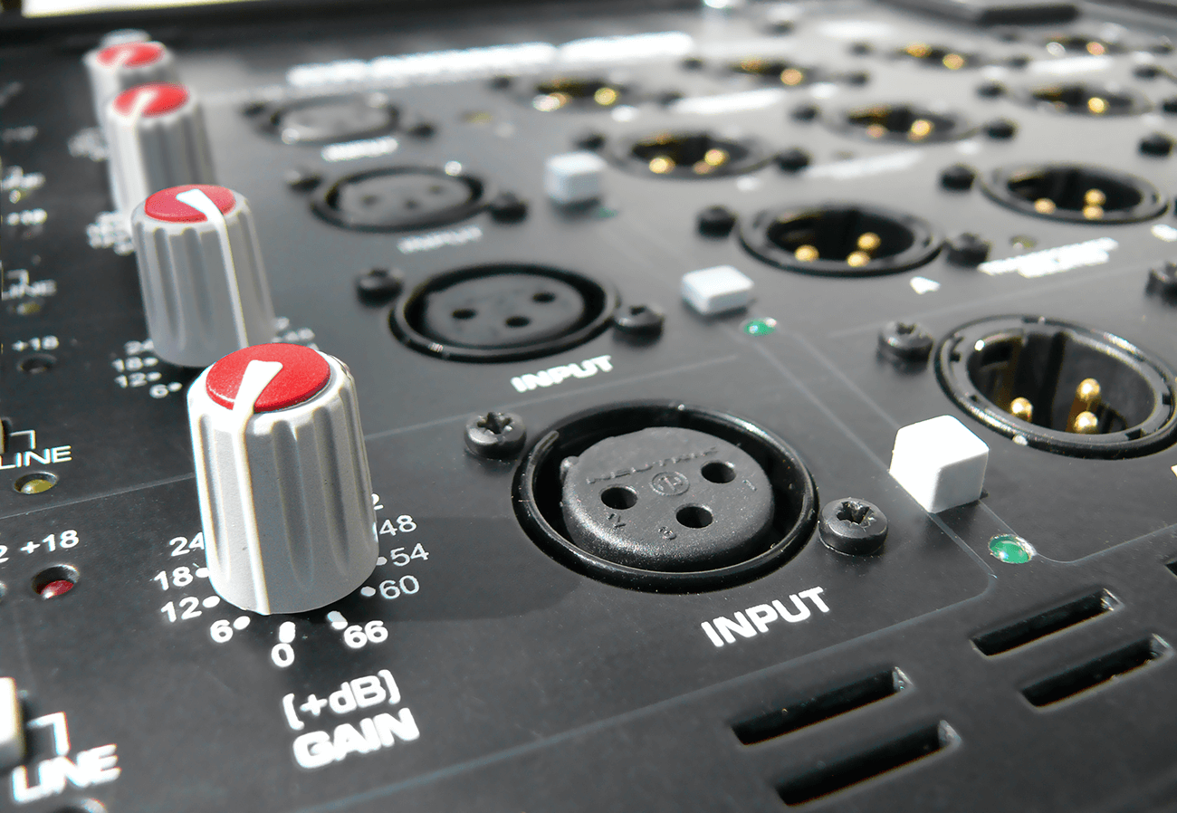 A close-up of the 4X4 gain and input xlr